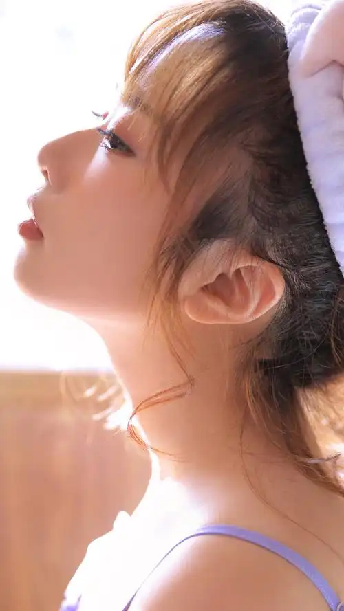 清爽丸子头美女手机壁纸