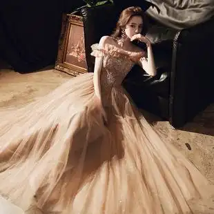 年会晚礼服女2020新款香槟色流苏高贵大气敬酒服主持人礼服裙长款