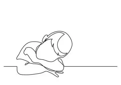 小男孩做梦靠在桌子上画着连续的线