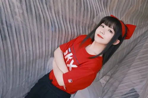 > 赖美云红色蝴蝶结俏丽写真图片(4/7)