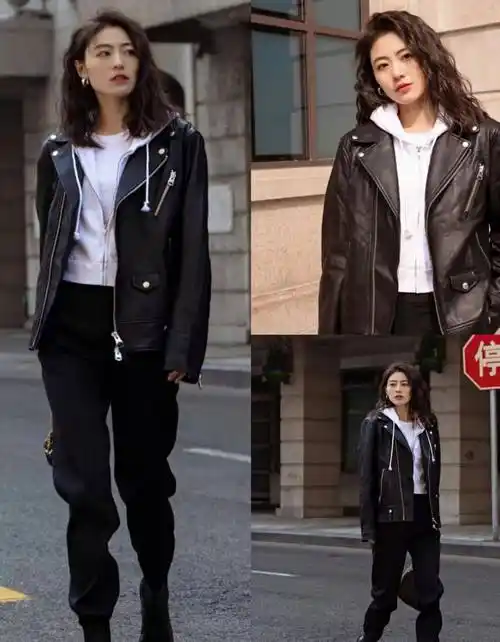 穿黑色的西裤搭配黑色的短皮靴,延续整体的酷味风格,一身穿搭简约舒适