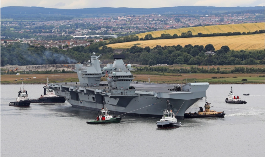 英航母伊丽莎白女王号"逆行"出海 防长:有疫情 船长有全部权限