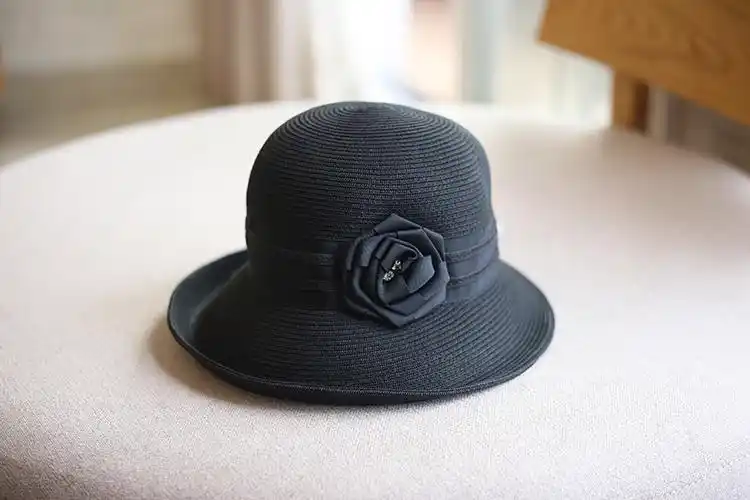 法国轻奢帽子女春夏草帽时尚卷边防晒出游盆帽花朵渔夫帽宽檐休闲圆顶