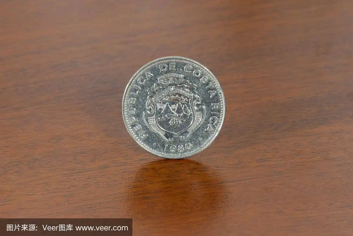 哥斯达黎加硬币25美分1980年,货币上的木材纹理.