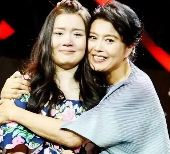 而母亲丁嘉丽,她更是一面也没有见过,只在电视上看到母亲的身影.