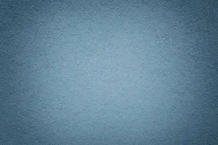 灰蓝色的天空纹理的旧灰纸背景特写. 致密浅蓝色牛皮纸板的结构.