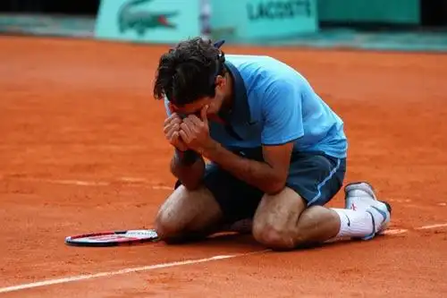 组图:详解费天王夺冠瞬间 跪地痛哭到破涕为笑