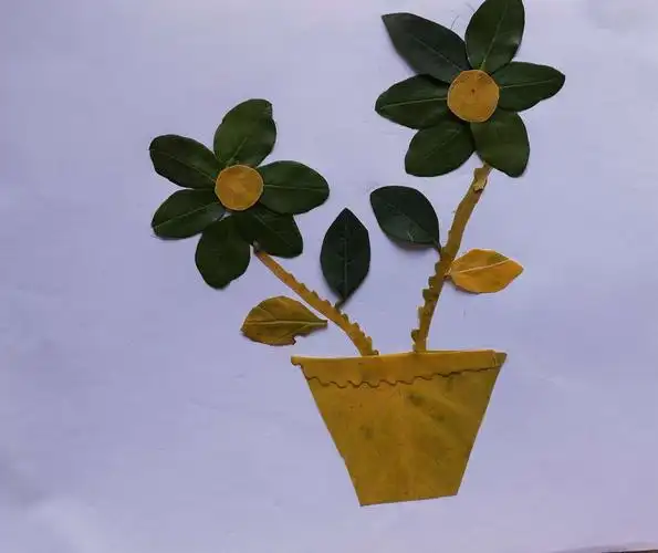 《读不完的大书》——树叶拼贴画