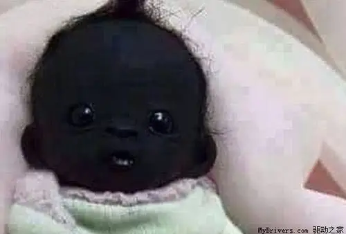 组图:"世界上最黑孩子"出世 父母以此为荣