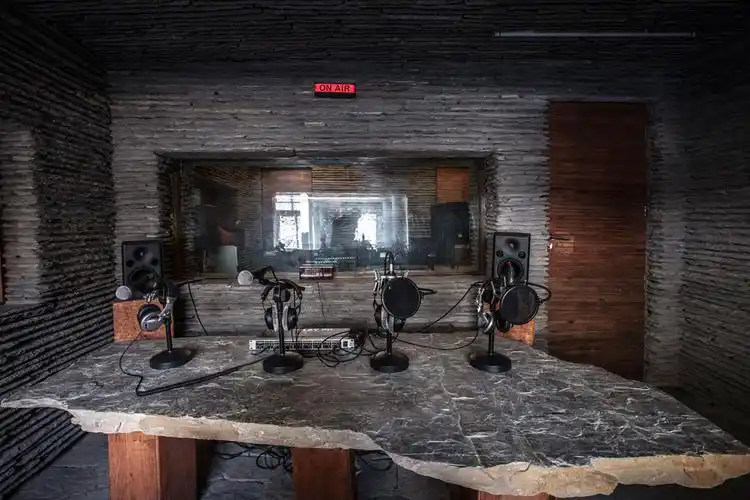 coursed stone: radio station in the himalayas