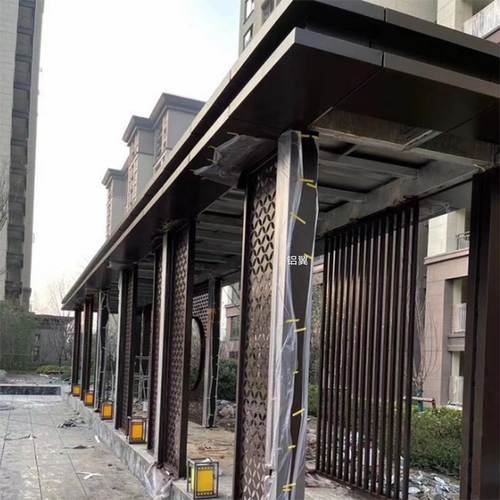 住宅楼别墅铝板门头_铝翼雨棚门头咖色铝单板厂家