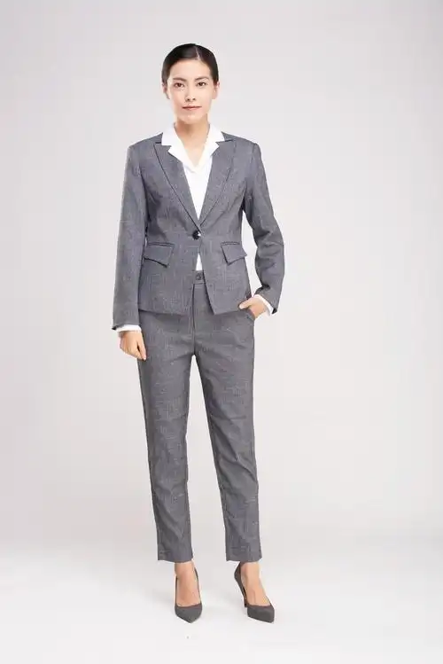 女性商务形象照背景图片穿西装的男孩公司年轻的客服接待人员特写图片