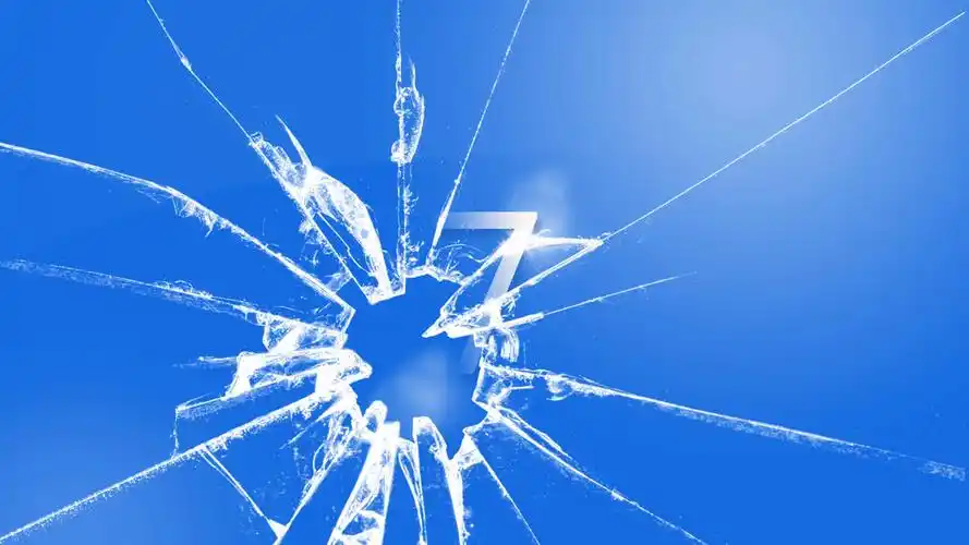 硬物击破的屏幕,蓝色背景碎屏图片