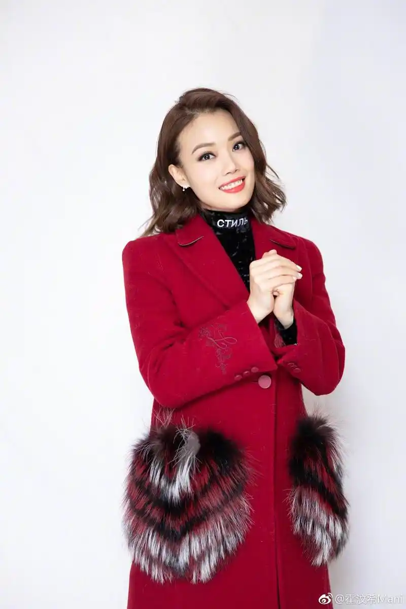 容祖儿春晚造型曝光 深红外套喜气洋洋