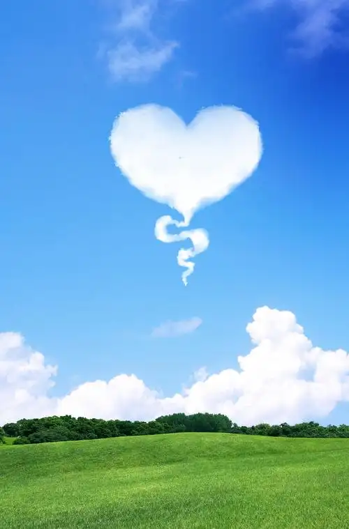 蓝天白云爱心草地印刷背景