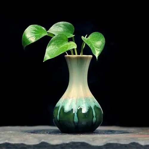 创意手作粗陶花瓶 采用陶瓷材质,手工制作,造型简约现代,创意个性