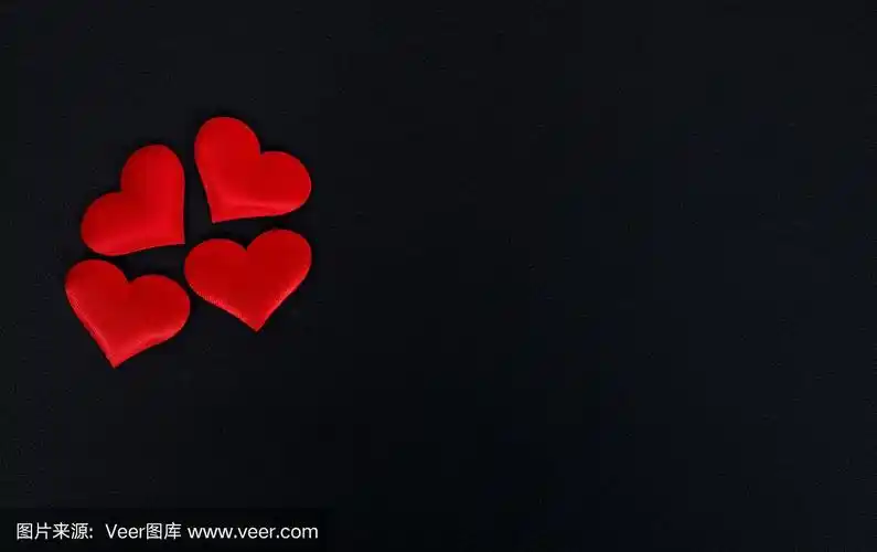 心形在黑色的背景-情人节的背景