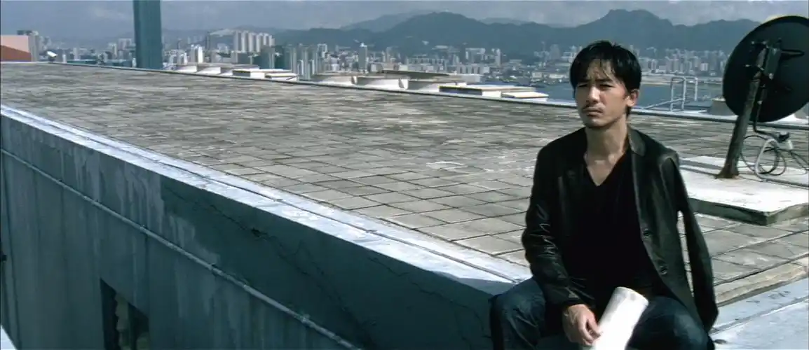 与刘建明的结局相比,陈永仁的结局才是善终,深度解析《无间道》