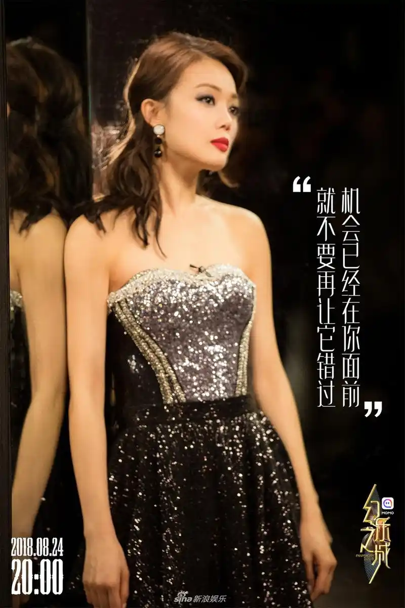 组图:容祖儿上演爱情故事眼神神秘撩人 红唇卷发女人味十足