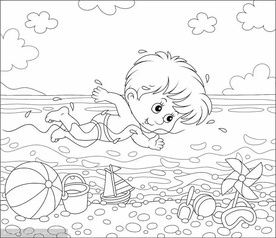 一个男孩在海滩的水里游泳