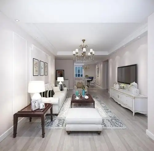 客厅整体墙面浅粉色的墙漆配上白色的布艺沙发,使得空间温馨大气.