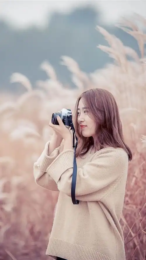 亚洲女孩使用相机,芦苇 iphone 壁纸