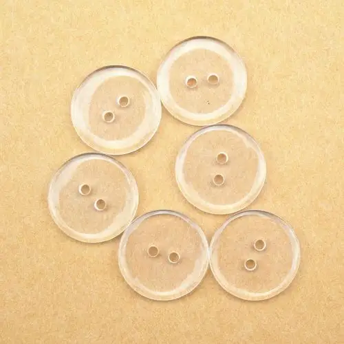 厂家直销服装辅料树脂扣二眼透明面包衬衫毛领纽扣垫扣现货批发