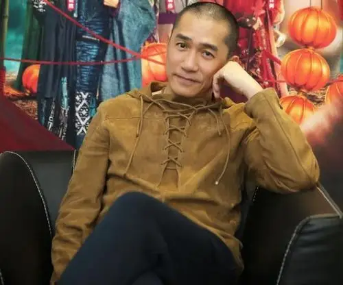 梁朝伟一直很有童心春节打麻将赢一点就跑