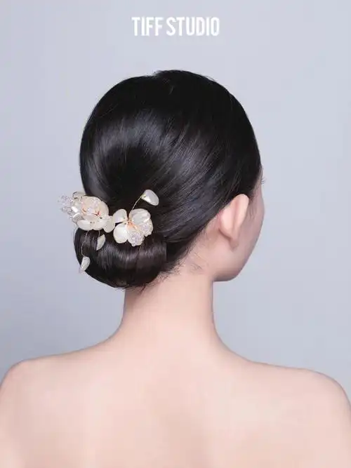 94韩式低盘发韩式新娘盘发注重质感07造型简约9999给人温婉娴