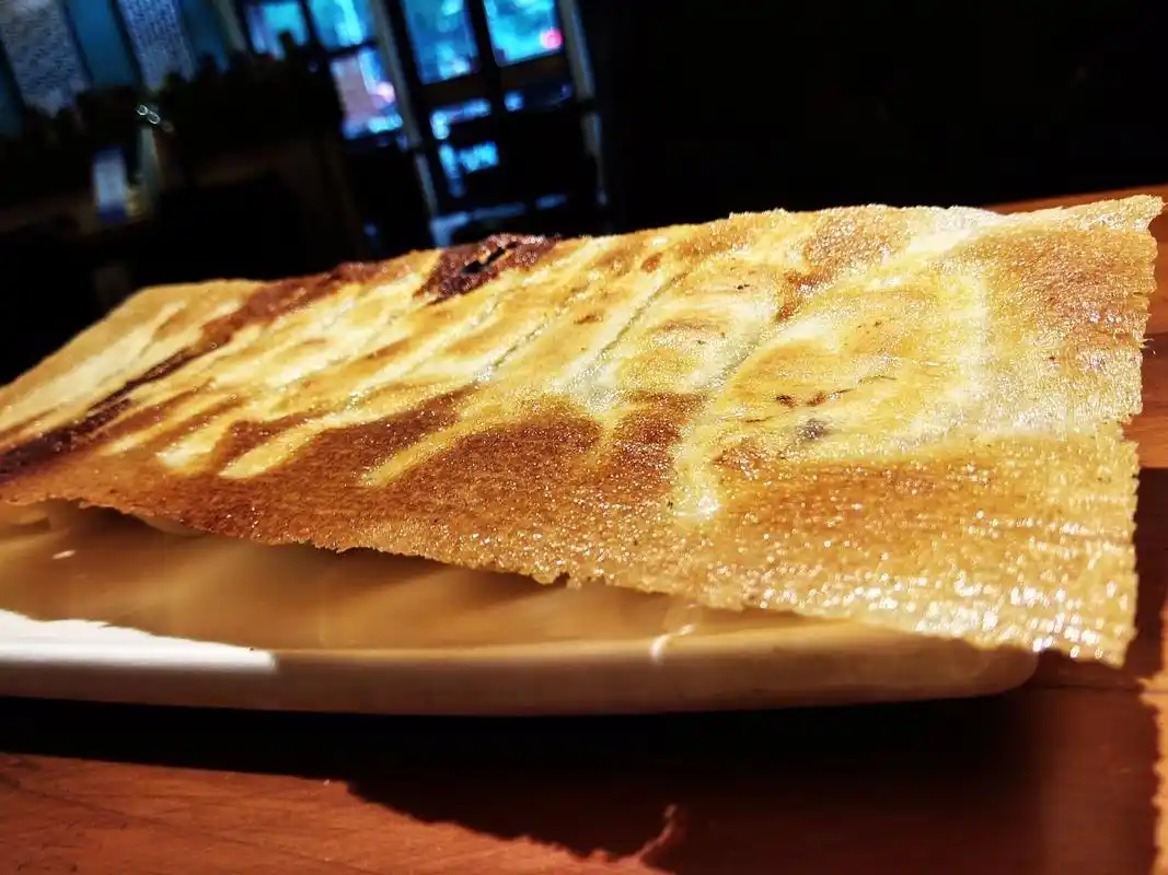 鉴味河南开封老店稻香居的美味传统锅贴