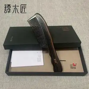 谭木匠黑檀梳子图片