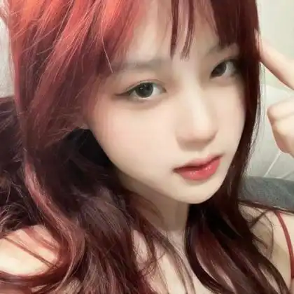 头像真人红头发女生