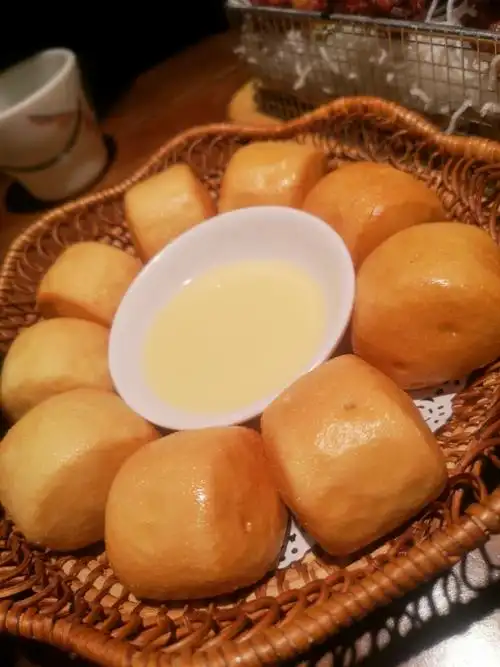 奶油的奶香味和油炸的小馒头味道完美相融,一口一个打开你的味! !