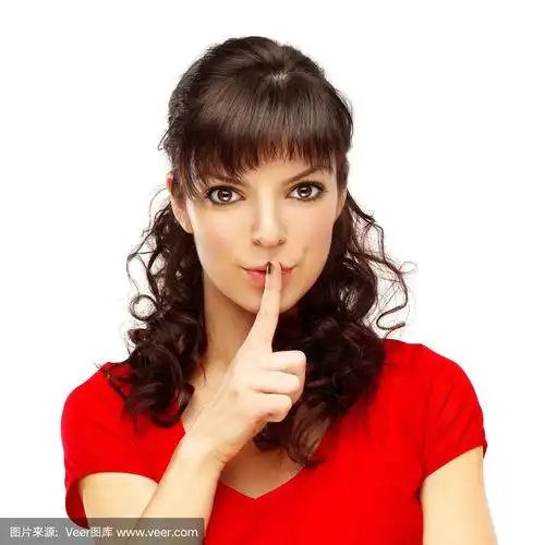 年轻的女人在嘘,女孩把手指放在她的嘴唇上.