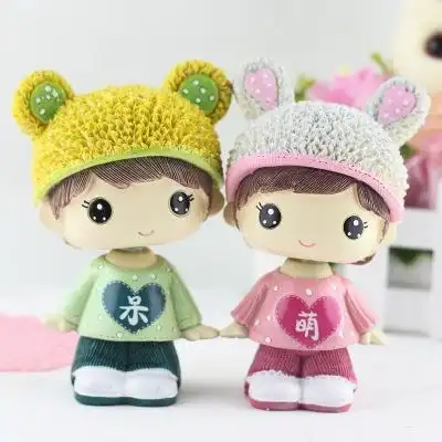 呆萌摇头情侣公仔图片