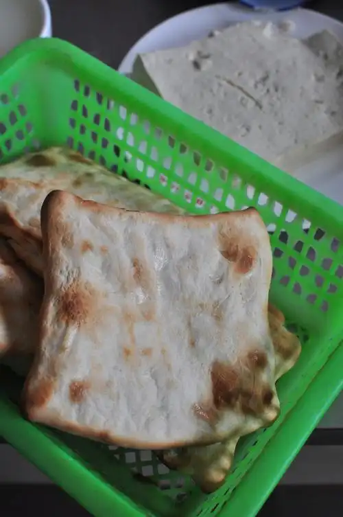 莱芜清晨的方火烧和块豆腐,火烧温暖,豆腐温柔