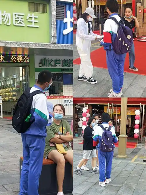 (图为银川二中学生正在发放传单)