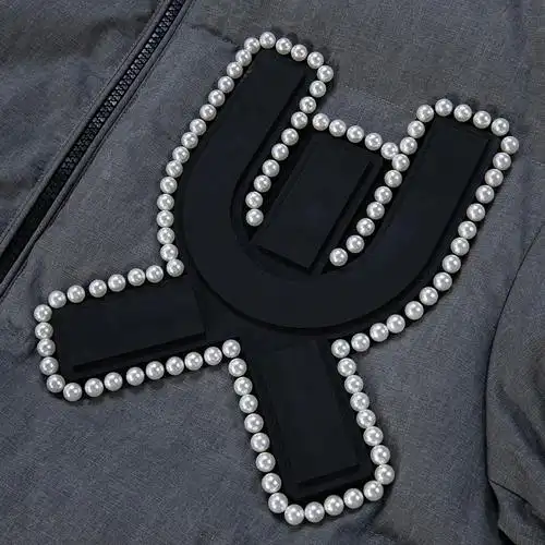 uooyaa乌丫2021冬季新款正品水洗复古大logo钉珠有趣时髦羽绒服