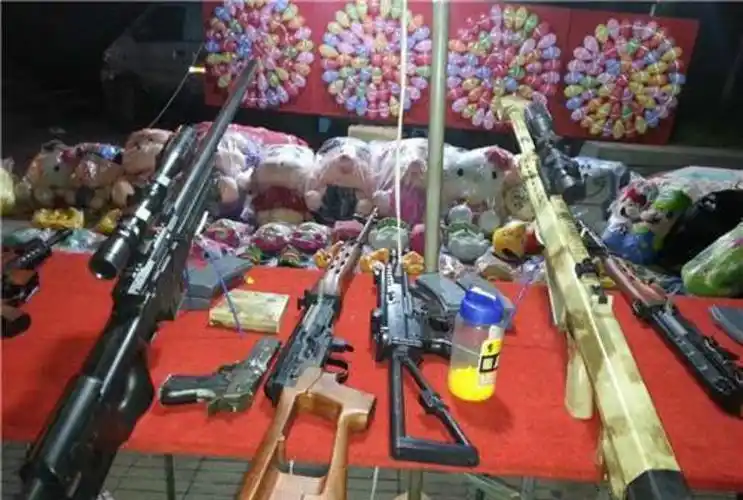 团结湖参考|射击摊的枪,或许只威胁了气球的安全