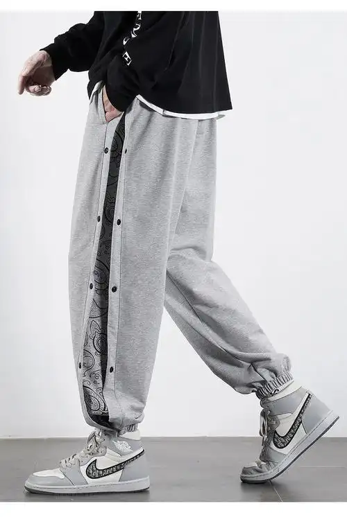 男生学生夏天穿的侧边排扣裤裤子男夏季潮流宽松束脚男裤腰果花运动潮