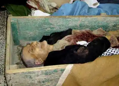 伊武装分子屠杀21名平民 死者枪眼清晰可见(图)