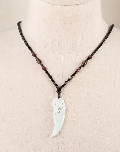 新款镂空雕刻龙头虎牙翡翠吊坠(附证书)