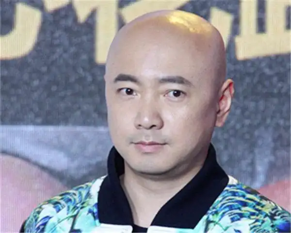 第十八位 徐峥光头造型深入人心,都不记得他有头发是什么样子了.