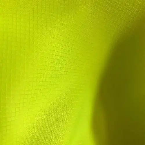 加厚菱形格子荧光绿环卫服反光布材料冲锋衣面料夹克布料75d*150d