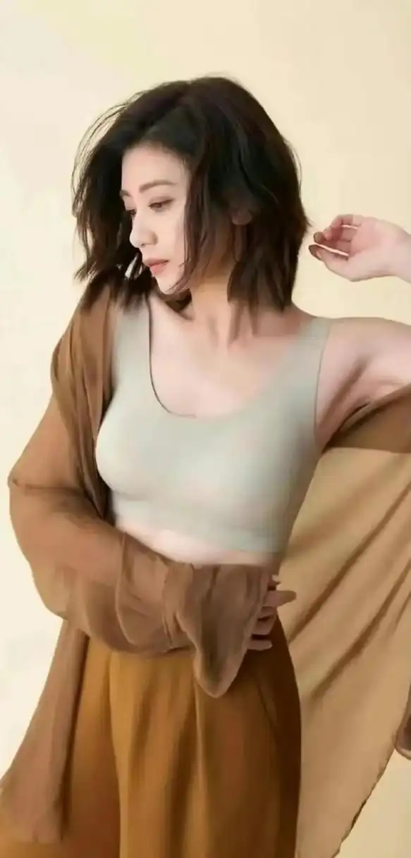 贾静雯性感写真,妩媚动人