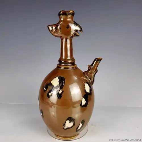 定窑紫定花斑纹凤首瓶