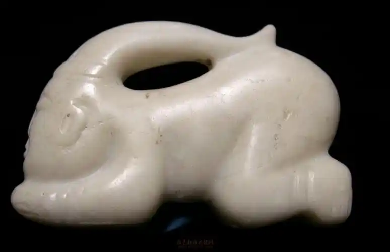 鉴赏鸡骨白……辽白玉件
