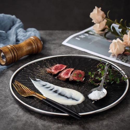 日式餐厅创意餐具圆形牛排披萨盘黑色复古意境菜融合菜冷菜摆盘子