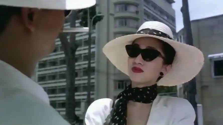 梅艳芳英雄本色里演的周英杰她的整个生命都融在这曲夕阳之歌里