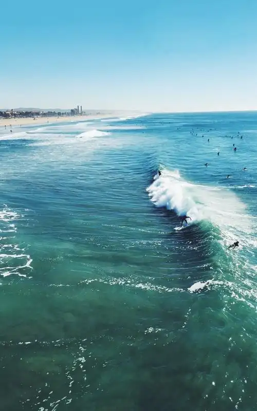 清新海滩浪花打来手机壁纸图片